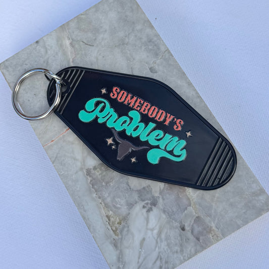 Motel Keychain: Somebody’s problem